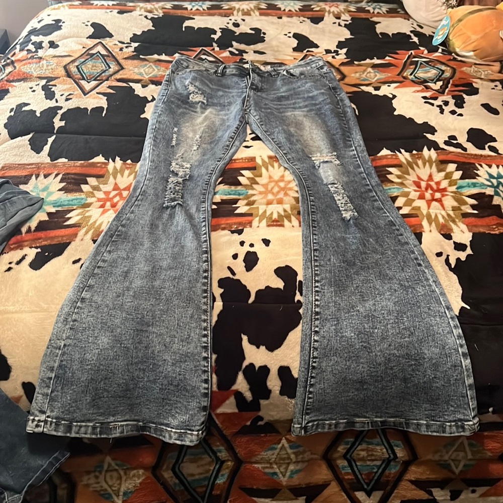 boot cut blue jeans, size 7 waist is size 28